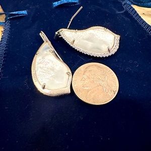 Kendra Scott white earrings with sparkly setting